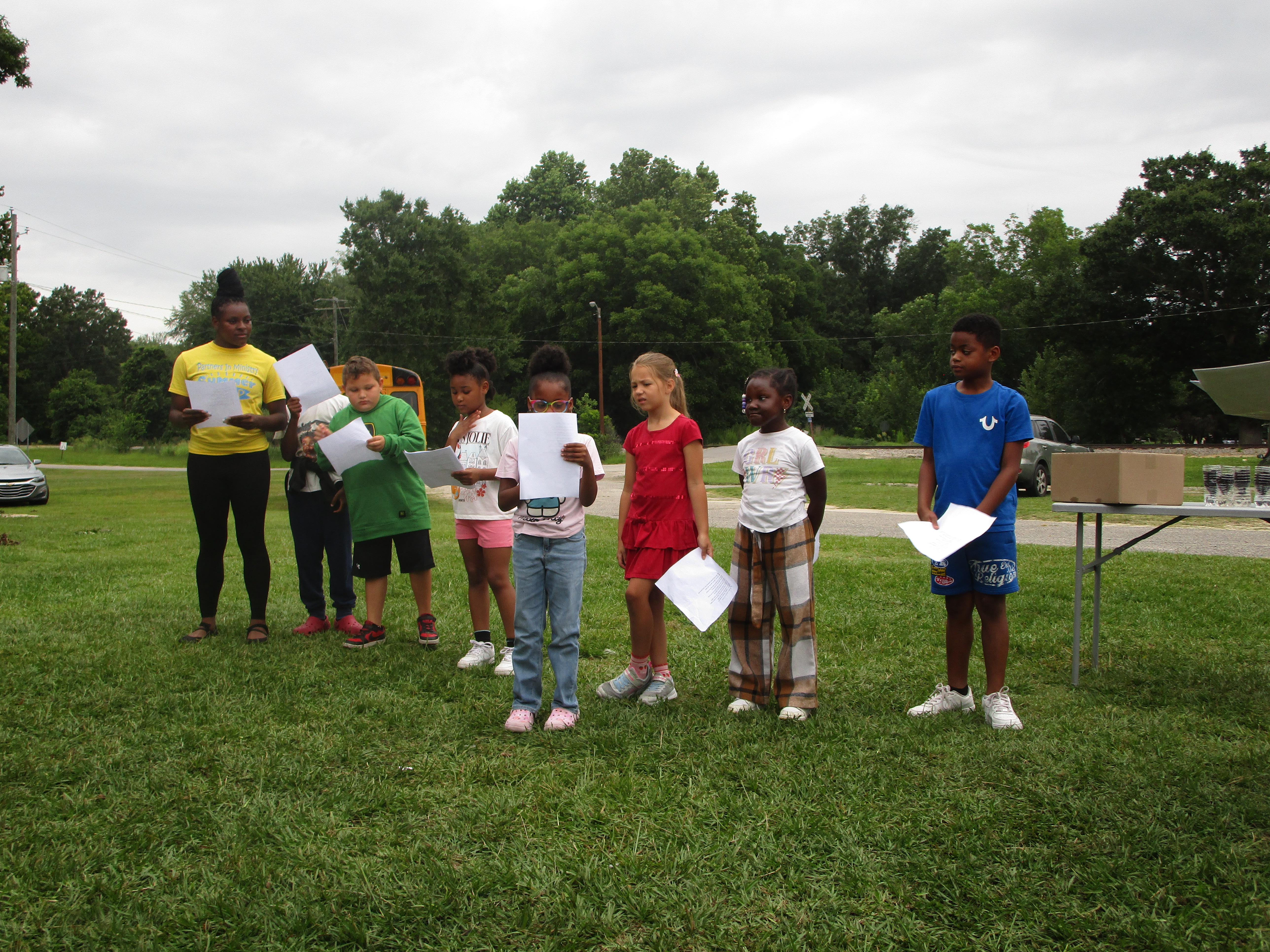 Second graders proudly pitched their "Self-Watering Plants" idea to the Sharks, turning their creative solution into a compelling business presentation. 